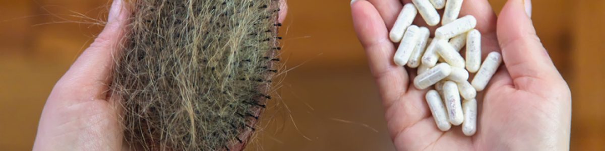 Hair loss vitamins for hair. Selective focus. hair loss with supplements